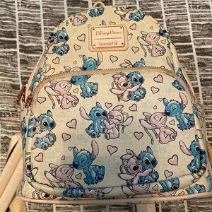 Disney Loungefly Stitch and Angel backpack.